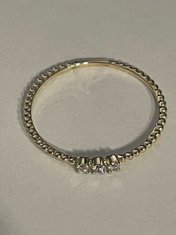 Bague or jaune corps perlé18k serti 3 diamants 